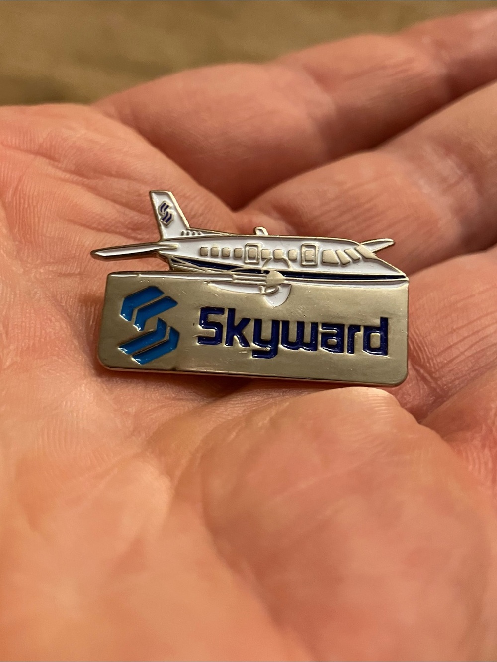 Silver Tone Skyward Airlines Airplane Collectible Souvenir Lapel Pin
